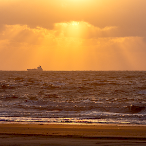 Sun rays stormy summer sunset